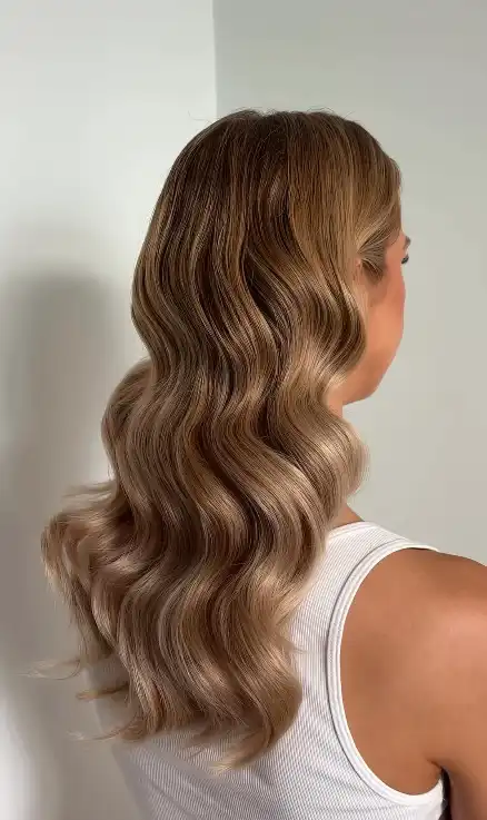 Sleek Tucked Behind Ear Style