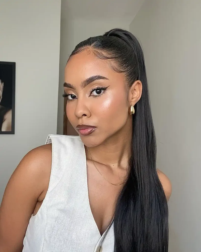Sleek High Ponytail with a Sculpted Finish